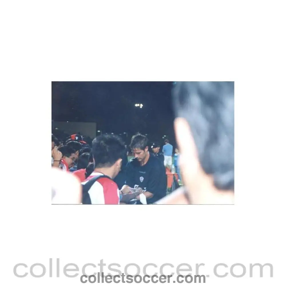 A Liverpool Player Giving Autographs Thai produced colour photograph - Collect Soccer