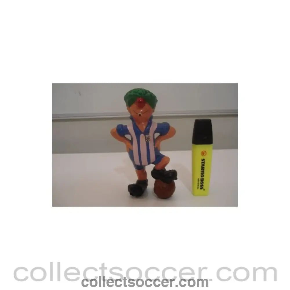 A comic footballer figure - Collect Soccer