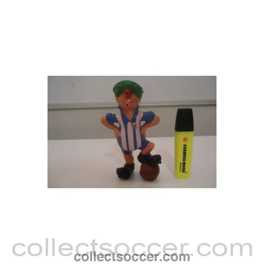 A comic footballer figure - Collect Soccer