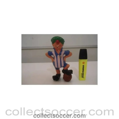 A comic footballer figure - Collect Soccer