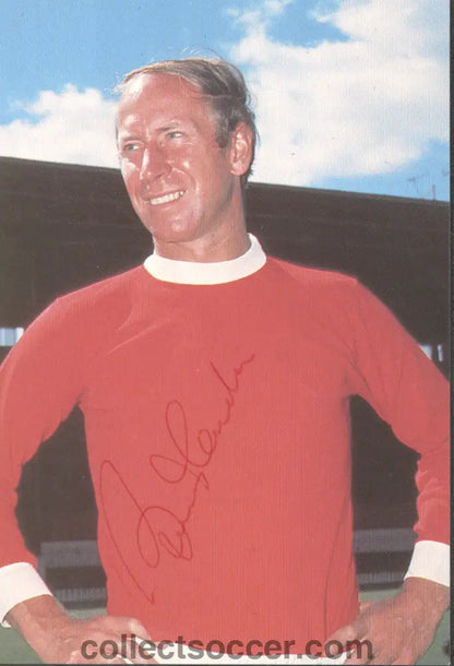 Bobby Charlton Original Signature on a Manchester United Postcard.
