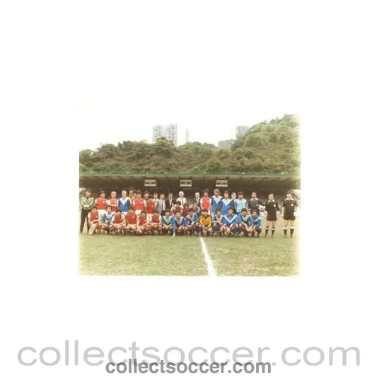 Manchester United large team photo with a guest team